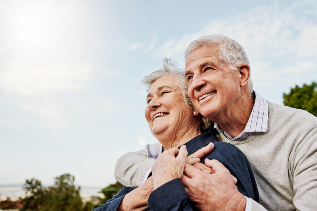 A happy elderly couple enjoying life thanks to their retirement accounts.
